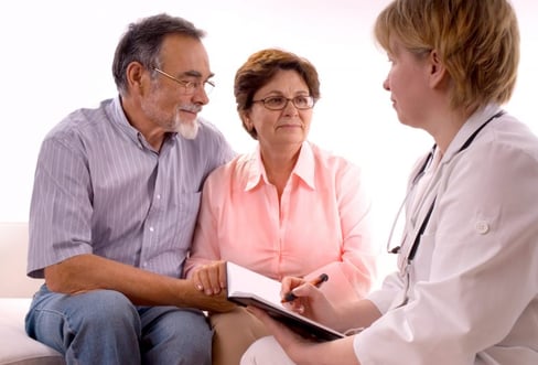 Elderly couple visiting doctor